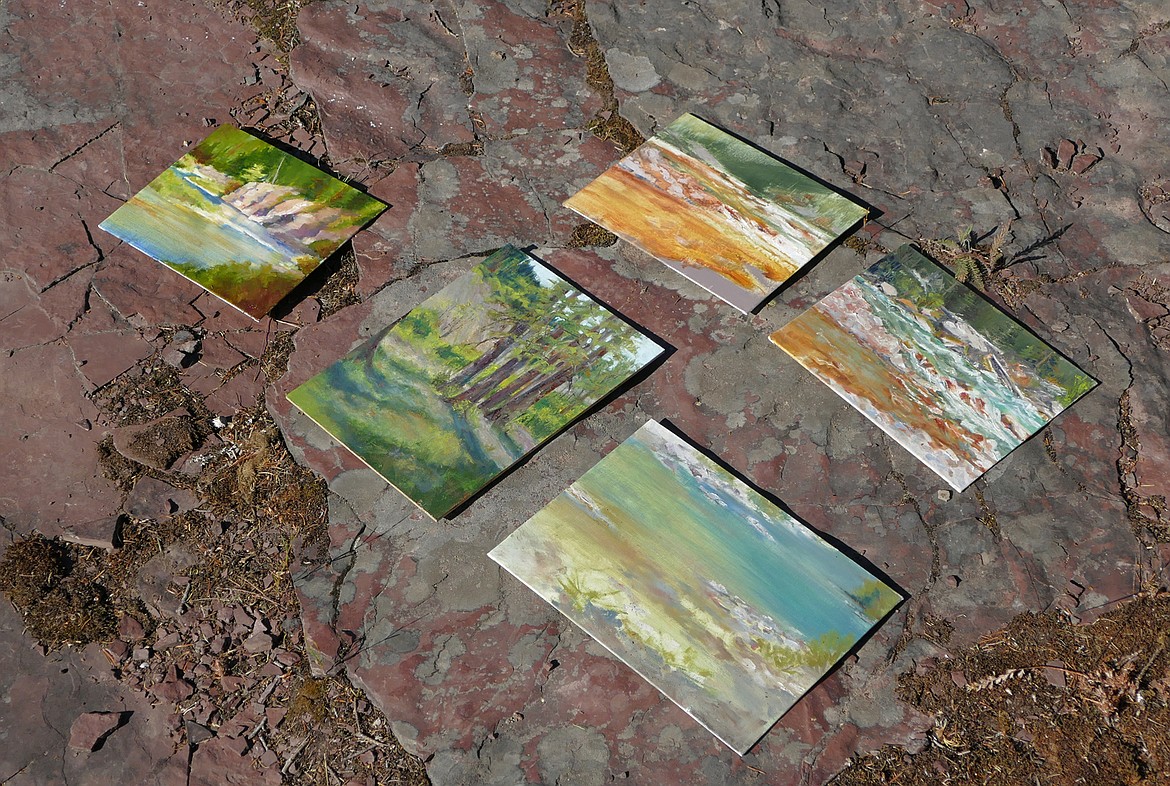 A few of Gini Ogle's paintings from her time in the Bob Marshall Wilderness. (Photo courtesy of Francesca Droll)