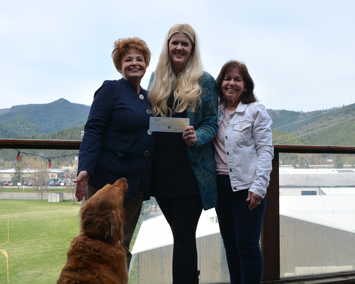 Autumn the dog, Juli Zook, Kyrsten Kennaugh and Rene Gilbert pose for a photo outside the Dirty Dog Saloon. Zook and Gilbert are part of the Cat Wranglers nonprofit to help stabilize the local cat population and the group recently held a fundraiser turning the bar into the "Dirty Kitty Saloon" for an evening. The check was presented by Kennaugh on behalf of the Dirty Dog for $4,200.