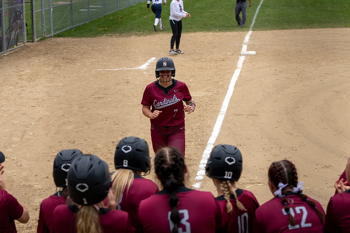 NIC ATHLETICS
North Idaho College sophomore Kennedy Hobson celebrates with her teammates after hitting a homerun in the first inning of the first game of a Northwest Athletic Conference doubleheader against Blue Mountain at Memorial Field on Thursday.