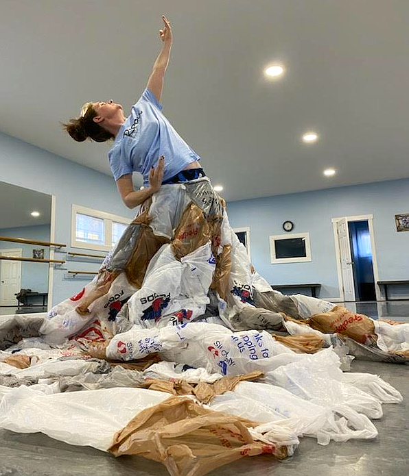 Crystal Bain, a fourth grade teacher and artistic director of Ripple Dance Company, rehearses among plastic bags for the free Community Water Dance event that will be from 10 a.m. to noon Saturday in Q'emiln Park in Post Falls.