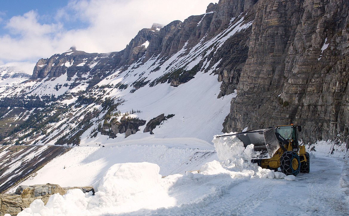 Crews clear snow at Rim Rocks on the Going-to-the-Sun Road in this file photo.