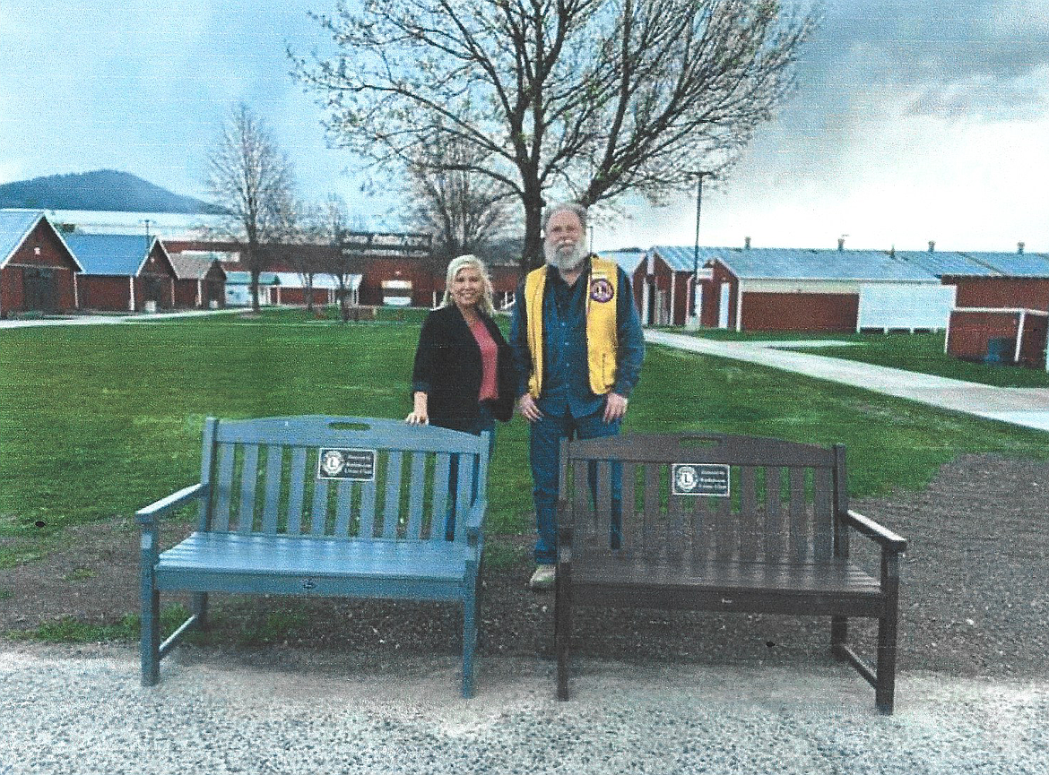 The Rathdrum Lions Club donated two park benches to the Kootenai County Fairgrounds. From left: Alexcia Jordan, general manager of the North Idaho State Fair, accepted the benches on behalf of the fair from Joseph Hume, president of the Rathdrum Lions Club. The benches are made by Trex and the Lion's club gathers discarded plastic as a service project to make them. It takes 609 pounds of plastic to make one bench and the Lions have donated several benches to nonprofits in the area. This donation was a special one to the fairgrounds and will be added to the area near the food court for people to relax and enjoy fair food and treats.