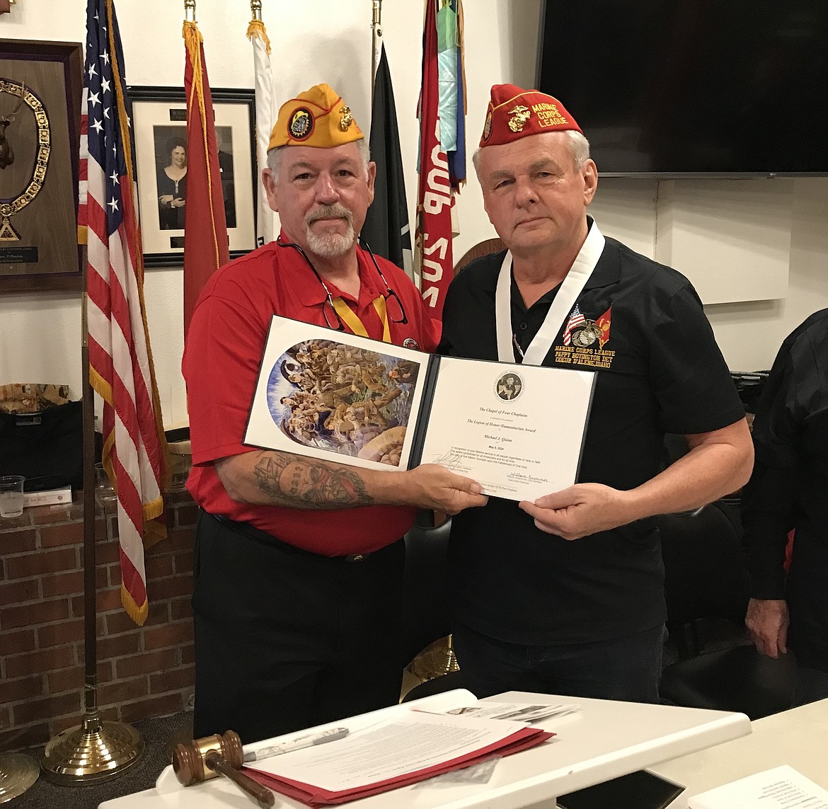 Michael Quinn, right, receives The Chapel of Four Chaplains' Legion of Honor Humanitarian Award from T.J. Morgan.