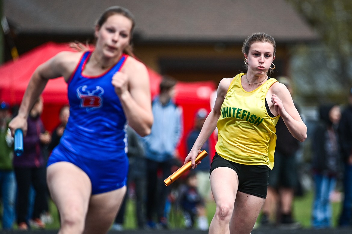 Whitefish's Rachael Wilmot runs the first leg of the girls 4x100 relay at the Whitefish ARM Invitational on Saturday, April 27. (Casey Kreider/Daily Inter Lake)