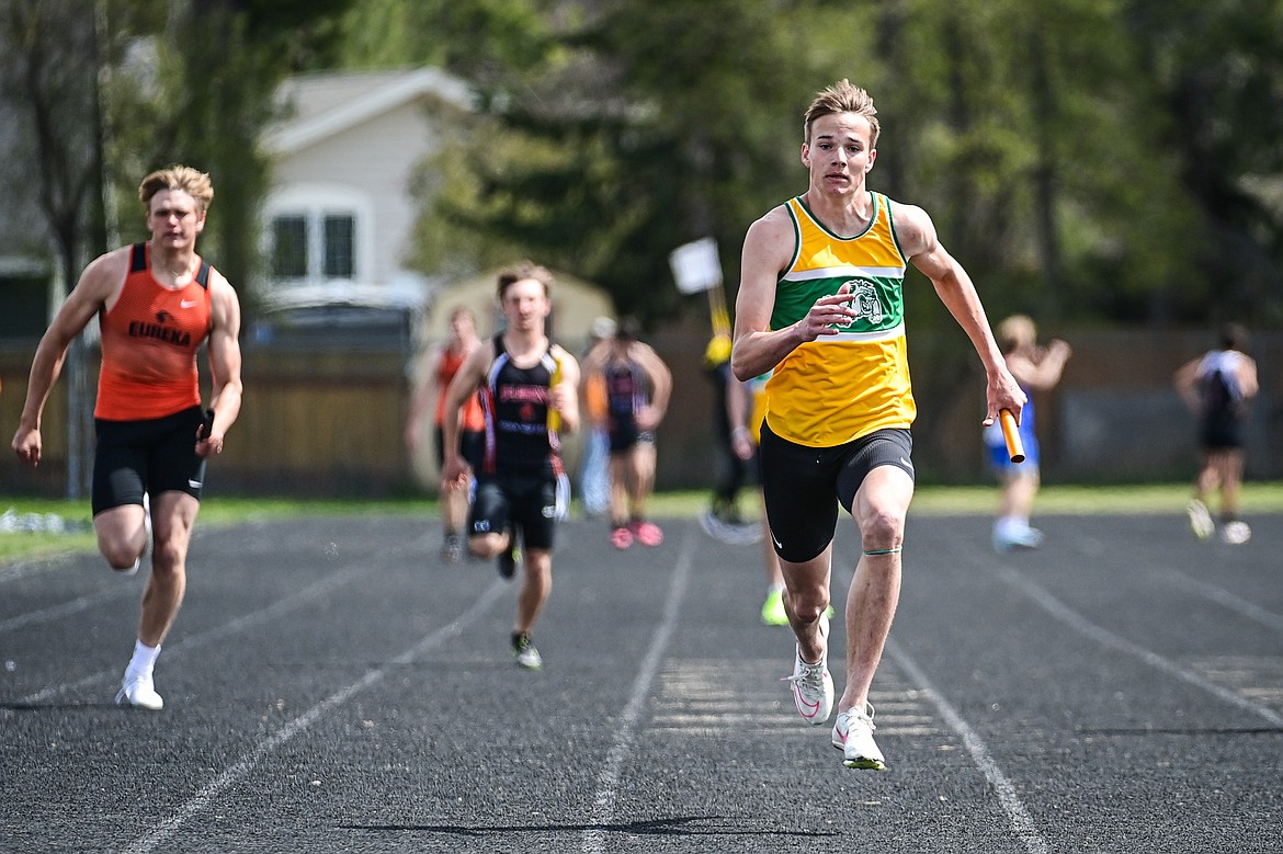 Whitefish's Carson Krack runs the anchor leg of the boys 4x100 relay at the Whitefish ARM Invitational on Saturday, April 27. (Casey Kreider/Daily Inter Lake)