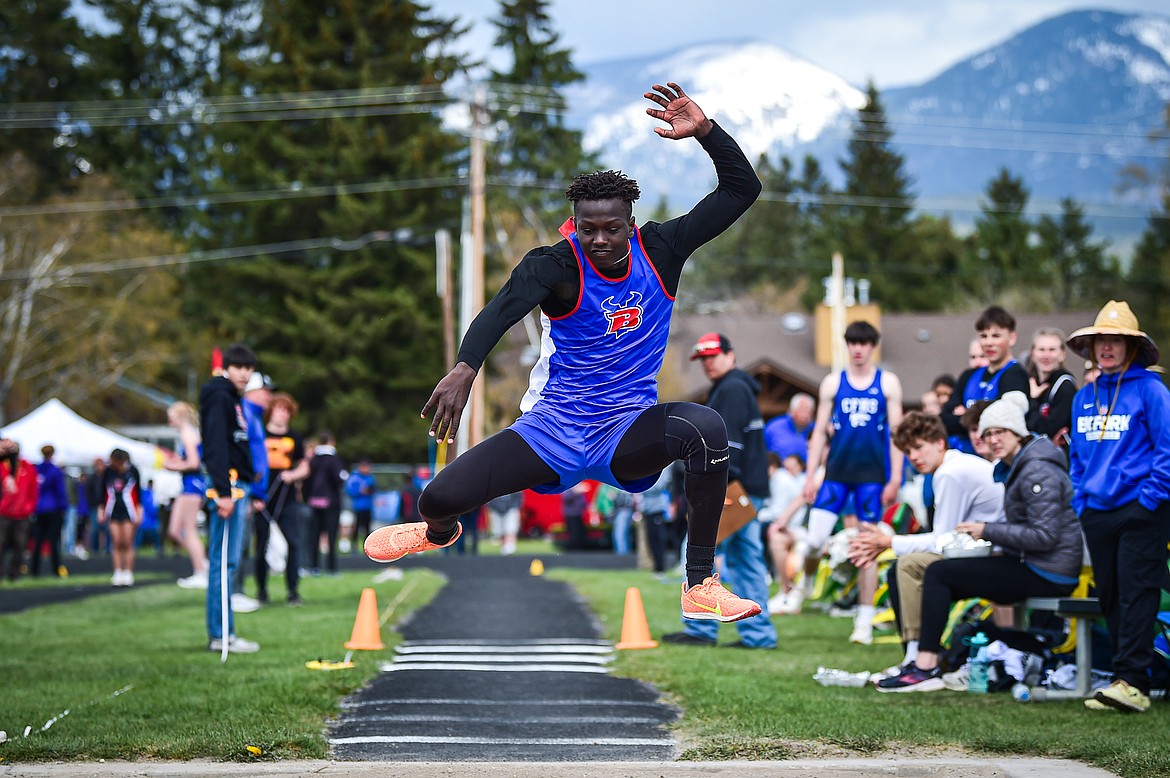 Bigfork's Tamret Savik competes in the boys triple jump at the Whitefish ARM Invitational on Saturday, April 27. (Casey Kreider/Daily Inter Lake)