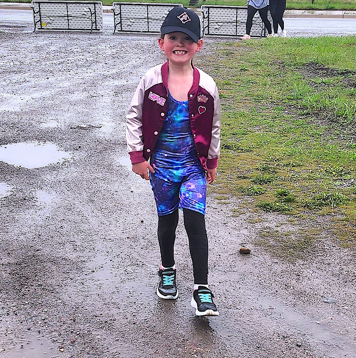 Six-year-old Audrey Claire Espinoza won the one-mile version of the Buttercup Run in Arlee on Saturday. (Berl Tiskus/Leader)