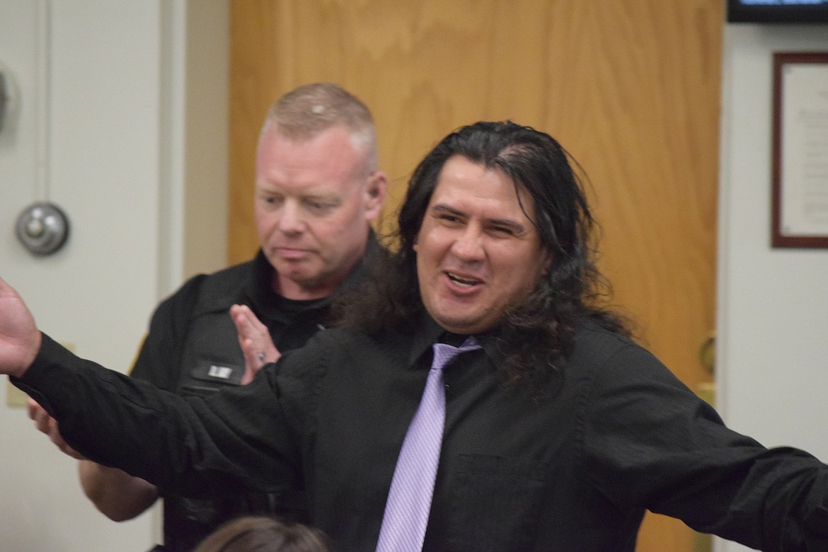 Eddie Navarro, Grant County Community Court's first graduate, smiles and laughs during a graduation ceremony held Wednesday during the program's weekly court proceedings. Navarro said the program helped him turn his life around and he is now enjoying life more than he ever has.