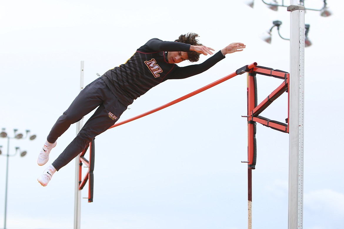 Moses Lake junior Caleb Donovan keeps his eyes on the crossbar while competing in the pole vault at Thursday’s meet against Eastmont, Davis and West Valley (Yakima). Donovan set a new personal best with a height of 11 feet.