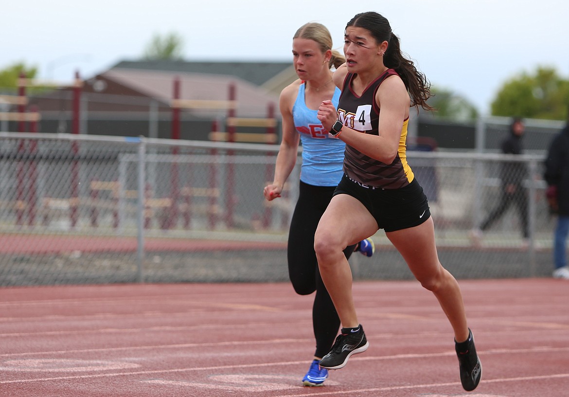 Moses Lake junior Kaiya Char (4) won the girls 100-meter dash at Thursday’s meet. The junior also won the girls 300-meter hurdles.