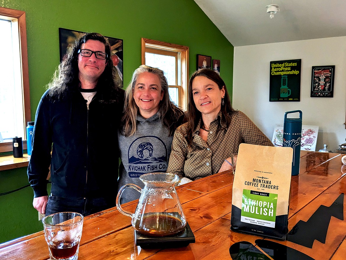 Alison Chopp, Zach Farnes and Katie Carlson brew fresh tastings of Ethiopa Mulish at their "coffee lab" at the Whitefish farmhouse location. (Kelsey Evans/Pilot)