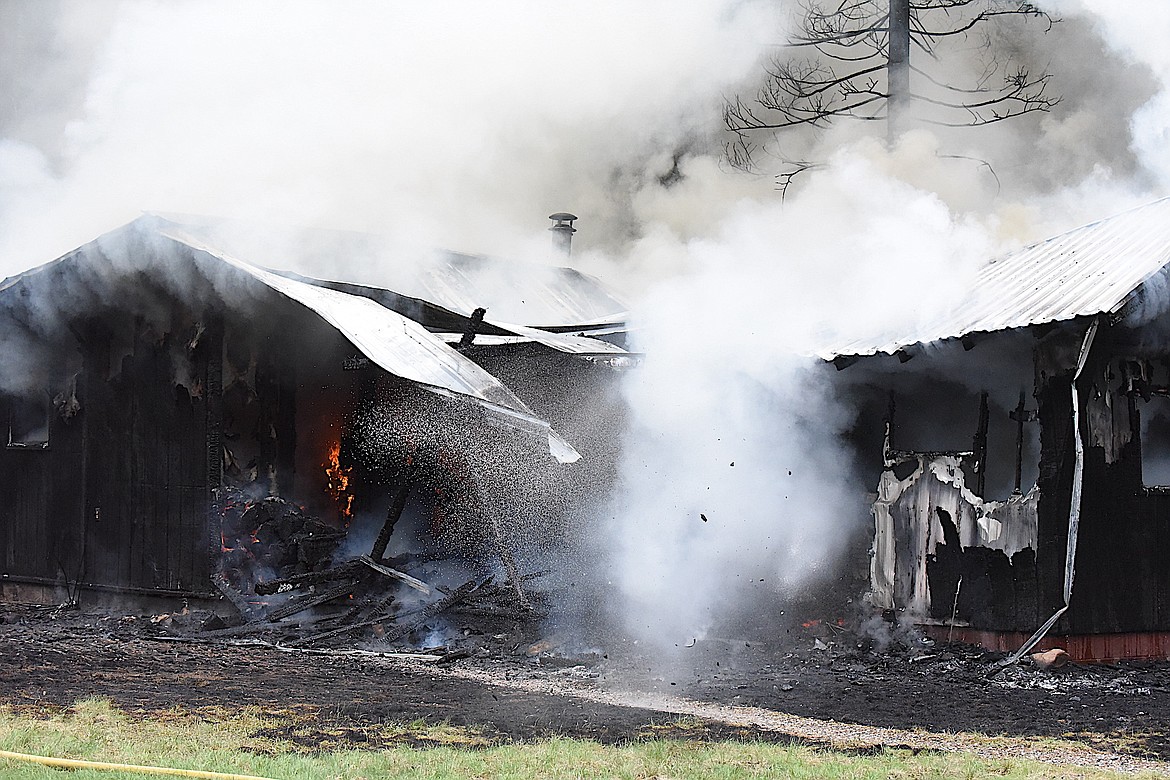 A Lincoln County resident died in a residential fire Sunday afternoon south of Libby. The cause of the fire and the person's death are under investigation. (Scott Shindledecker/The Western News)