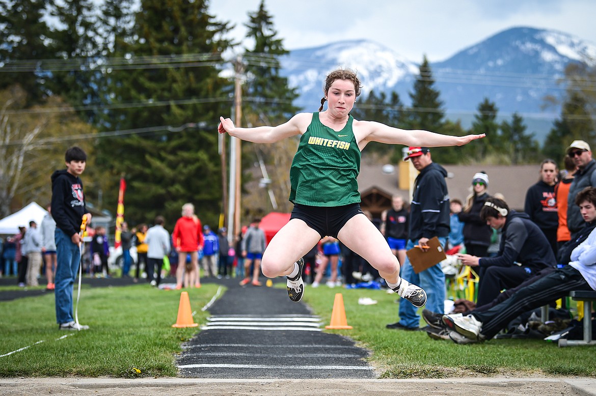 Whitefish's Hannah Gawe competes in the triple jump at the Whitefish ARM Invitational on Saturday, April 27. (Casey Kreider/Daily Inter Lake)