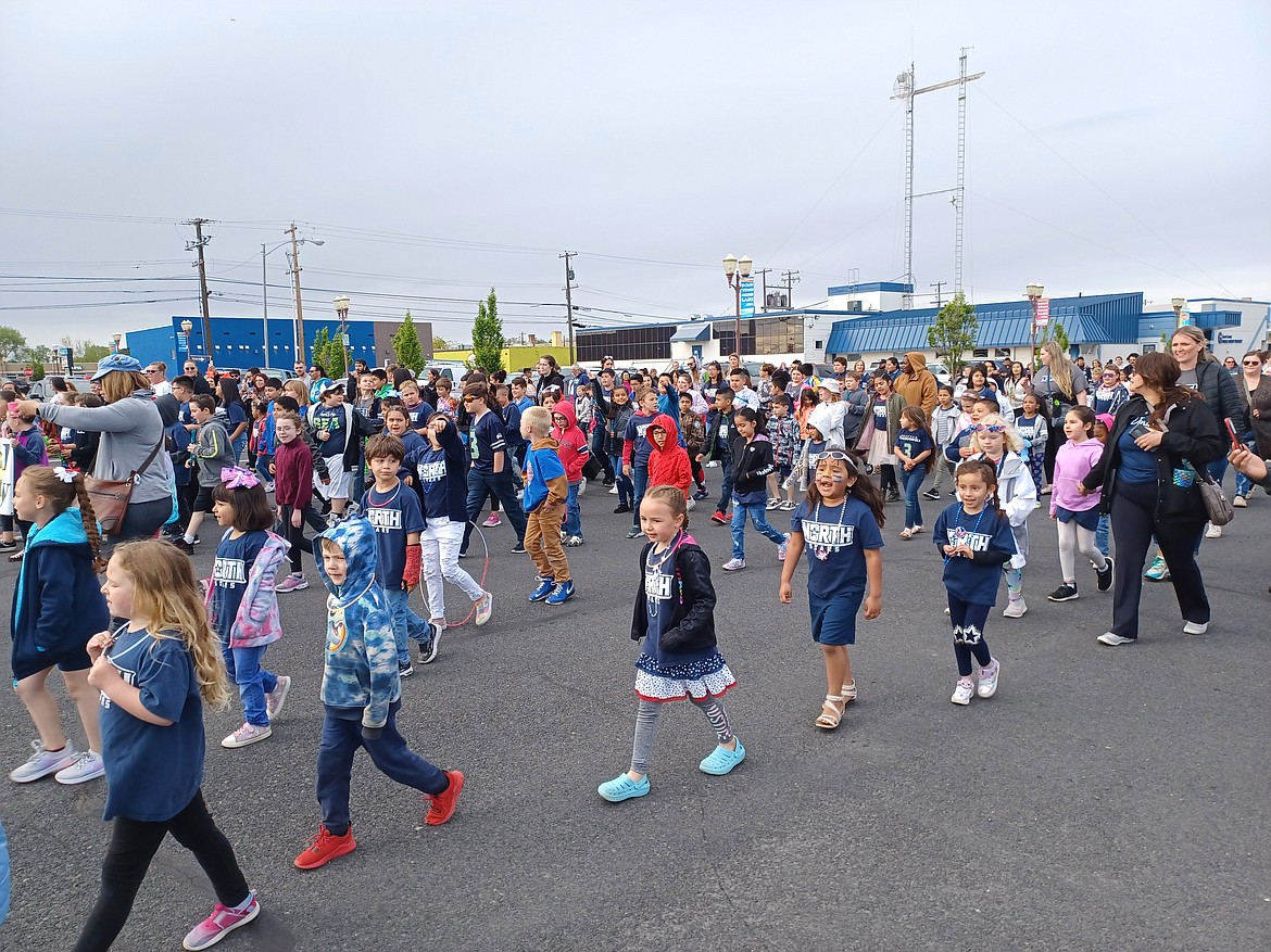 North Elementary School students march up Third Avenue during the 2022 Moses Lake Spring Festival Kiddie Parade. This year’s festival is May 23-26.