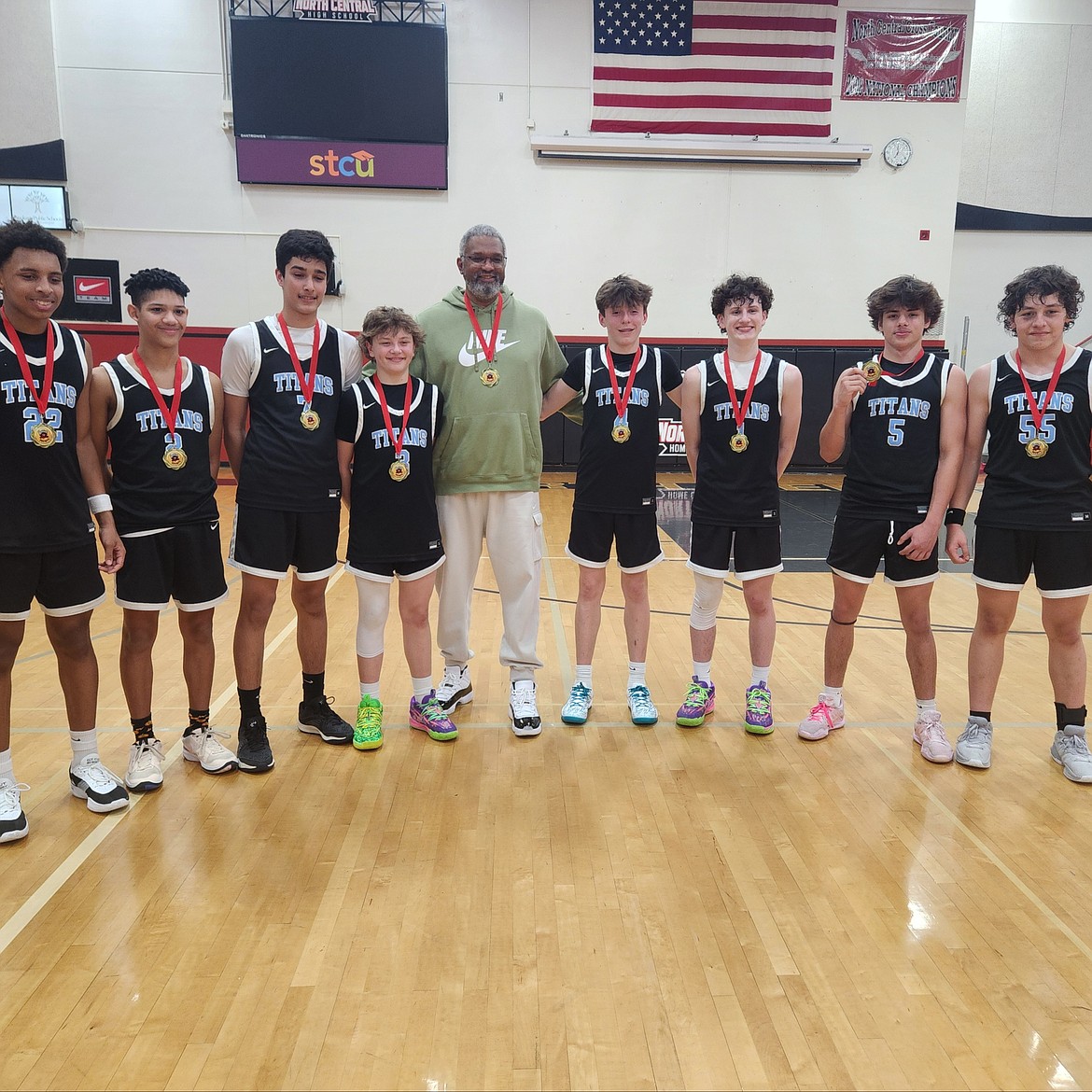 Courtesy photo
The 15U Titans AAU boys basketball team defeated the Sandpoint Futures 58-54 in the Swish Showcase championship played on Sunday in Spokane. From left are Miles Spencer, JaKolbe Lopp, Arjun Kandola, Sawyer Norisada (Post Falls), coach Leon Sayers, Evan Drew, Wallace Frates, Makya Quincy (Post Falls) and Rex Arroyo.