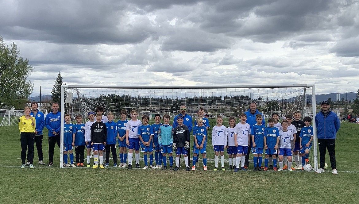 Sandpoint Albion SC's 2013/2014 boys are atop the Washington Premier League after defeating longtime rival Washington East Premier Surf 2013, 4-3, this past weekend. The boys now hold a 6-1 overall record. "We have a strong three-year rivalry with Surf Premier," Albion coach Eric Donenfeld said. "Every game is intense and close. The boys earned every bit of this thriller." Felix Carlson scored a goal during the fourth and 27th minutes to put Sandpoint Albion up 2-1 at halftime. Chris Medrano, fighting through an injury, found the upper left corner during the 45th minute to give Albion a 3-2 lead. During the 56th minute, with the game tied 3-3, Garrison Markwardt sent a cross to Jacob Moren, who caught the underside of the crossbar for the winning goal. Donenfeld said it was the team's best game of the season. Pictured, are both teams, memorializing three years of friendship. The two teams routinely collaborate and share players for events and friendlies.