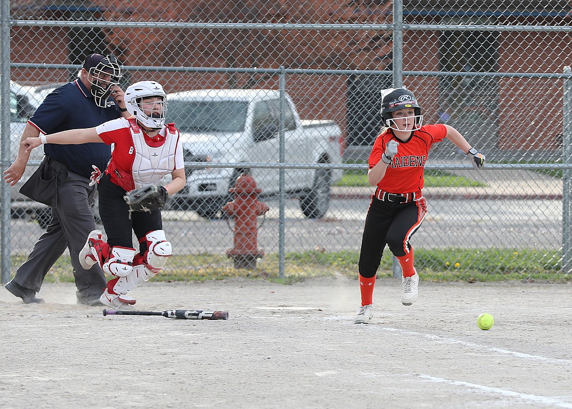Maiden Bailee Woll gets to first on a bunt during last week's double-header against Browning. (Susan Lake photo)