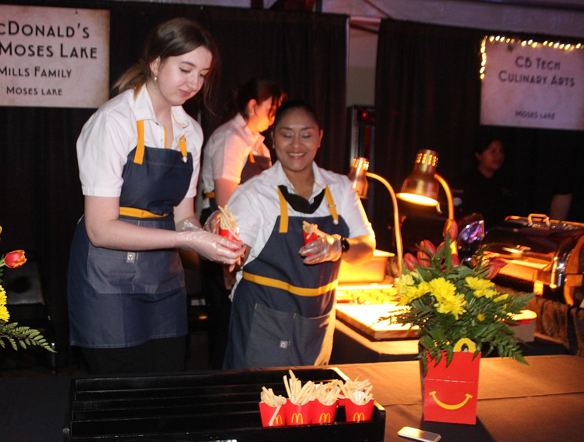 McDonald’s of Moses Lake employees prepare the company’s signature fries. The fries may not have won, but the red boxes with signature arches were seen at pretty much every table at the event.