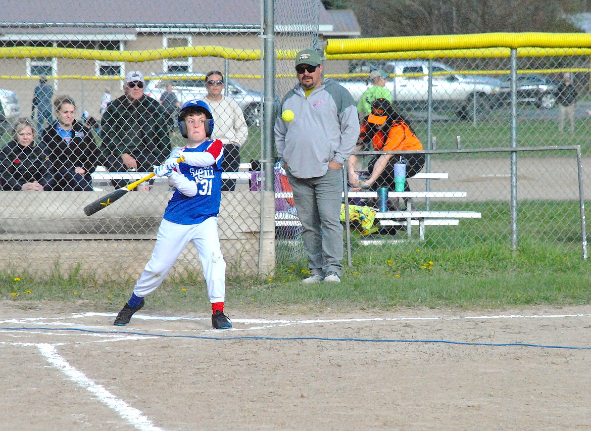 Bohde Henderson had his game face on as he connected with the ball last Monday night during the Superior Rookie's Blue Team game against Hot Springs. (Mineral Independent/Amy Quinlivan)