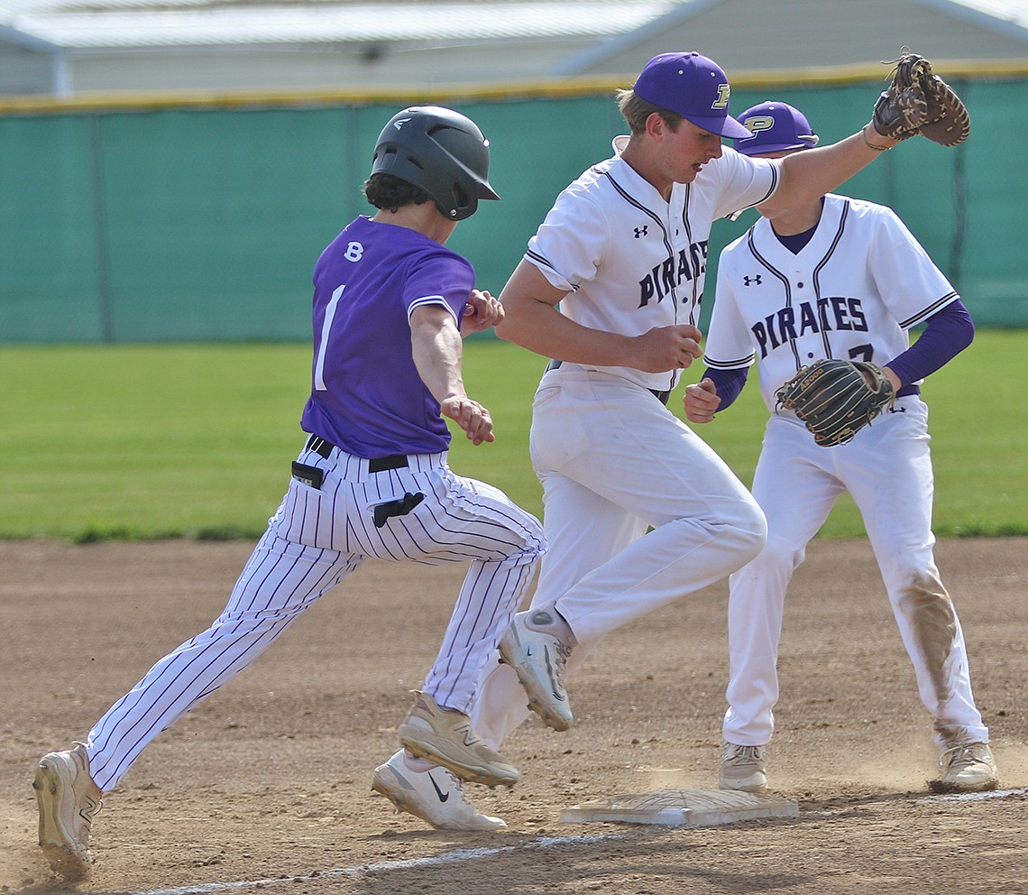 First baseman Hunter Emerson beats Butte player to the bag during last Wednesday's game in Polson. (Bob Gunderson photo)