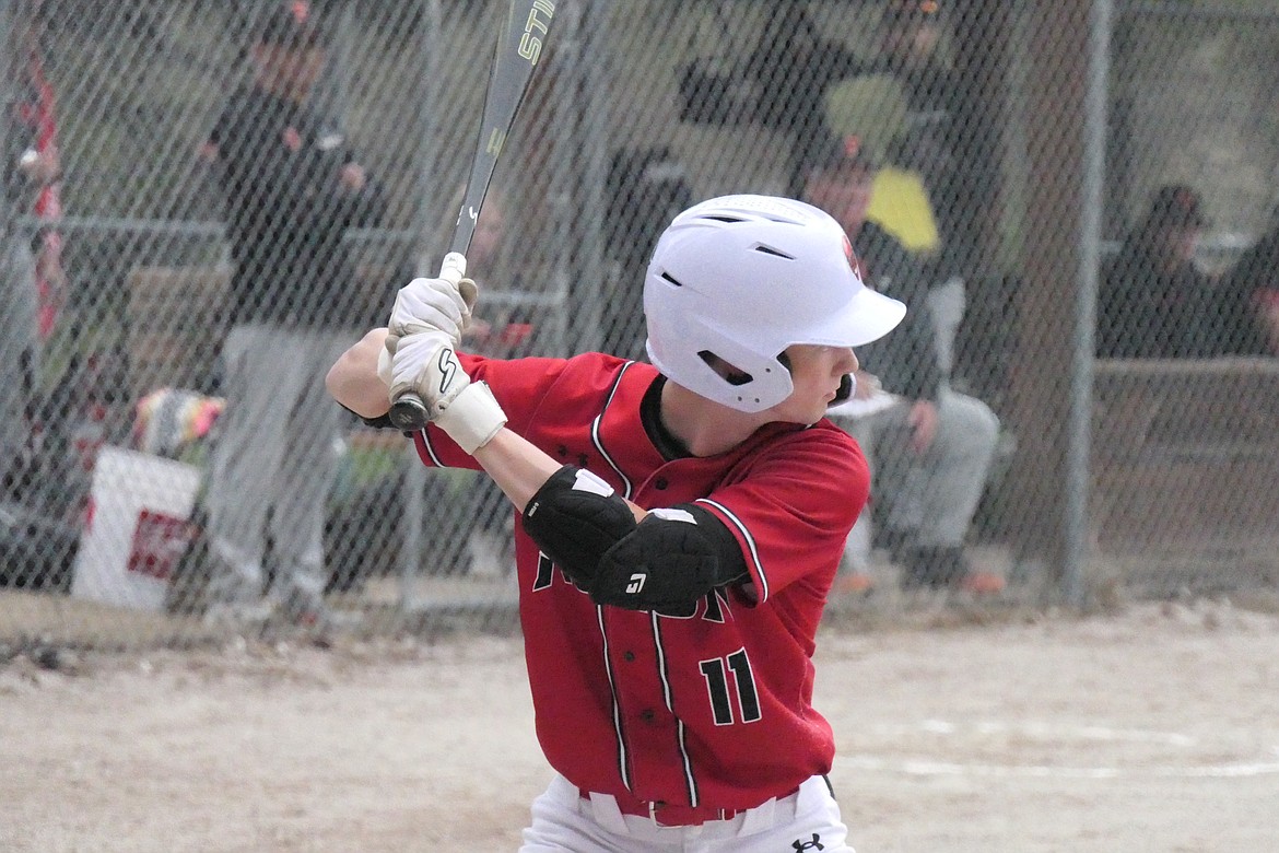 Noxon-Thompson Falls sophomore Finn Duffy waits for an incoming pitch during the Red Devils' game this past week versus Frenchtown in Noxon.  (Chuck Bandel/VP-MI)