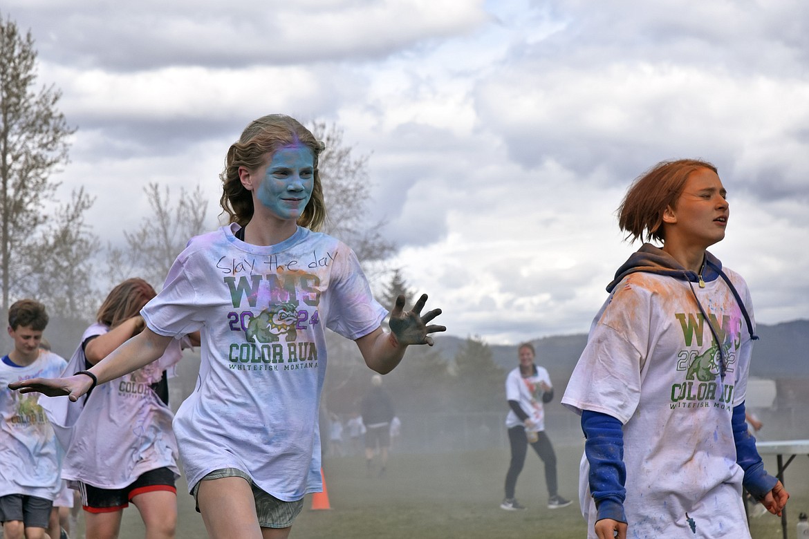 Mary Flannigan and Jade Fischer take blue and orange in stride (Kelsey Evans/Pilot).