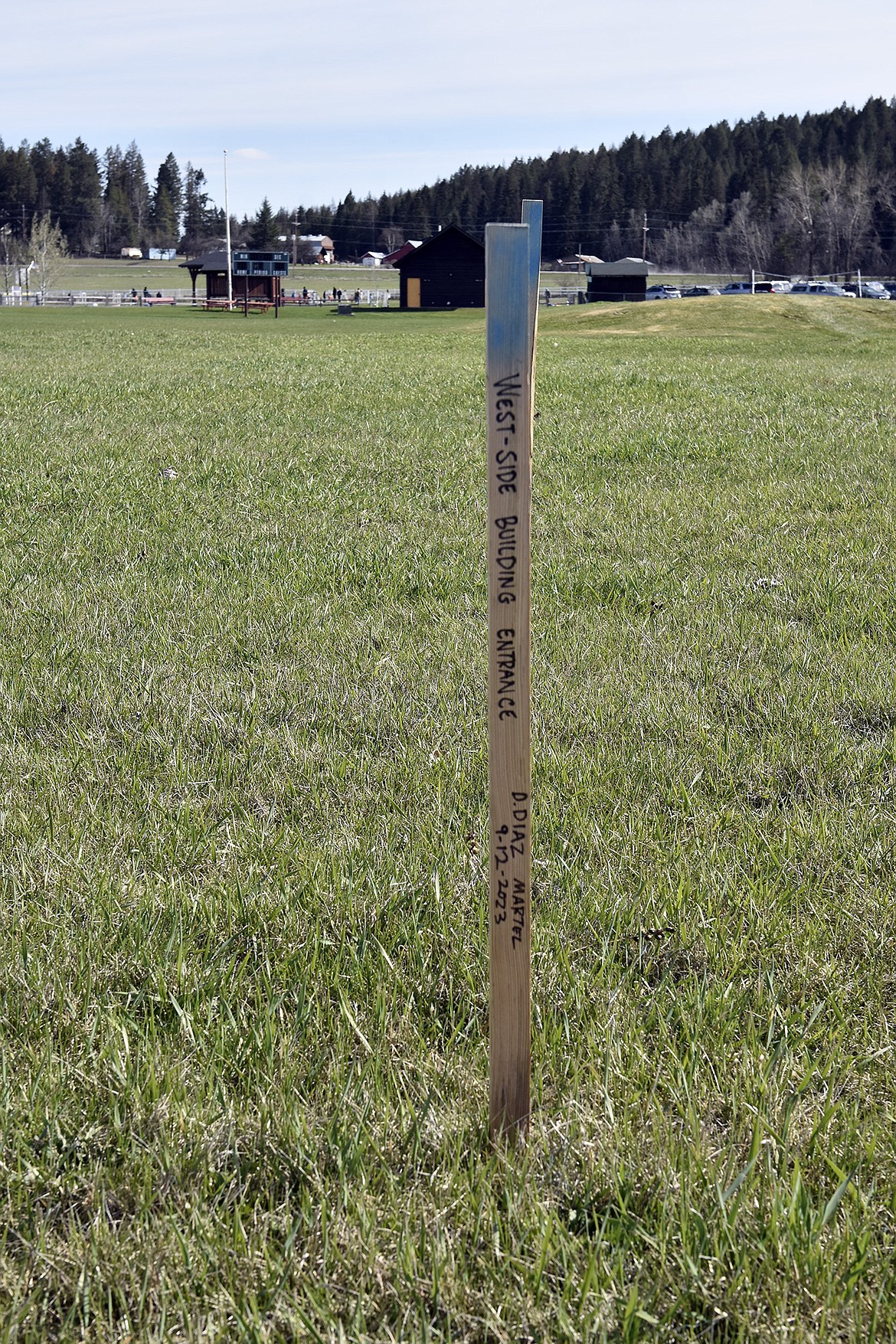 One of the stakes marking the location of the anticipated new North Valley Music School. (Julie Engler/Whitefish Pilot)