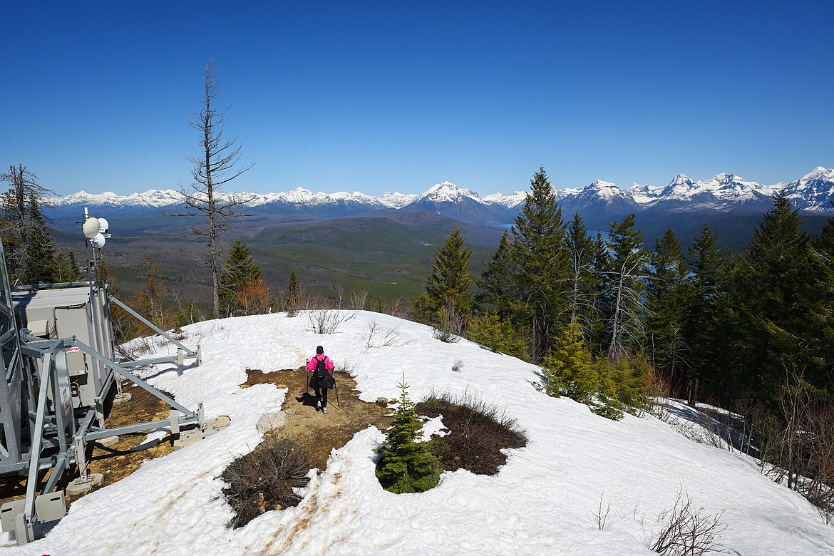 Kari G. of Kalispell enjoys the expansive views offered at Apgar Lookout in Glacier National Park. (Chris Peterson photo)