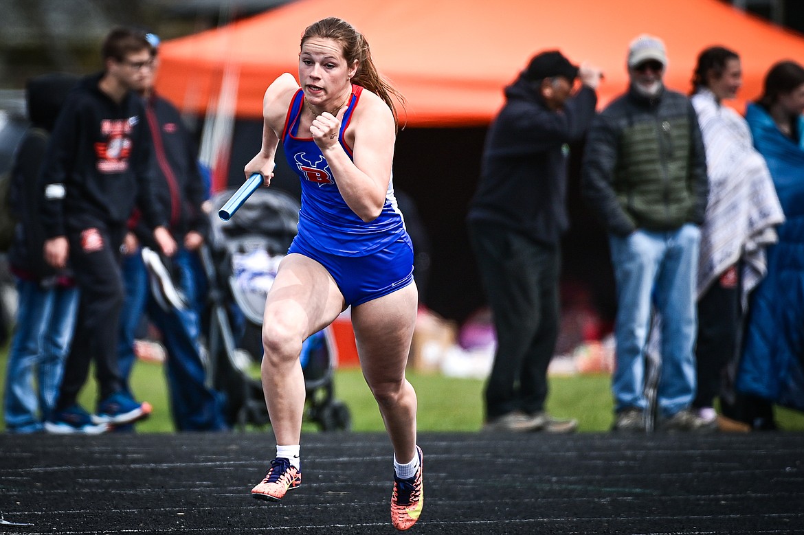 Bigfork's Danika Bucklin runs the first leg of the girls 4x100 relay at the Whitefish ARM Invitational on Saturday, April 27. (Casey Kreider/Daily Inter Lake)