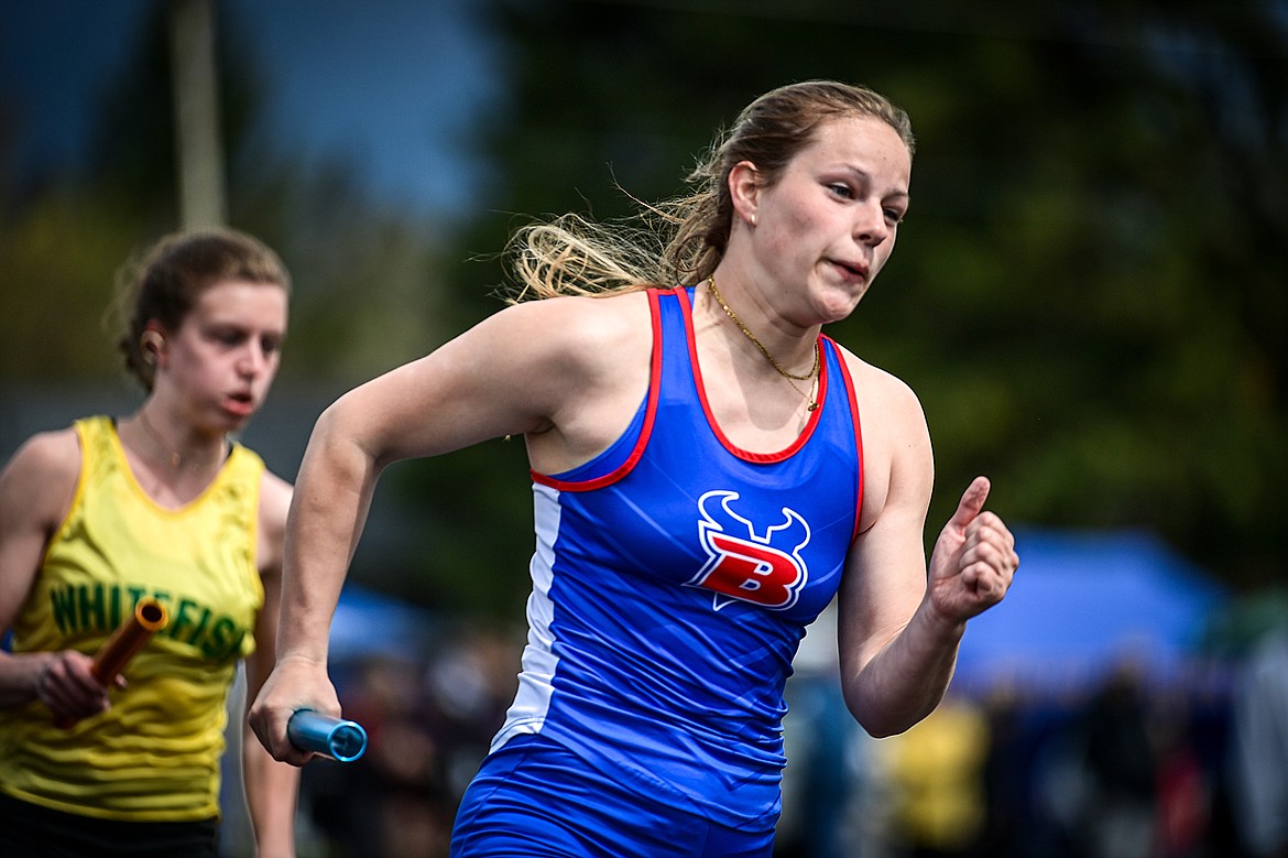 Bigfork's Danika Bucklin runs the first leg of the girls 4x100 relay at the Whitefish ARM Invitational on Saturday, April 27. (Casey Kreider/Daily Inter Lake)