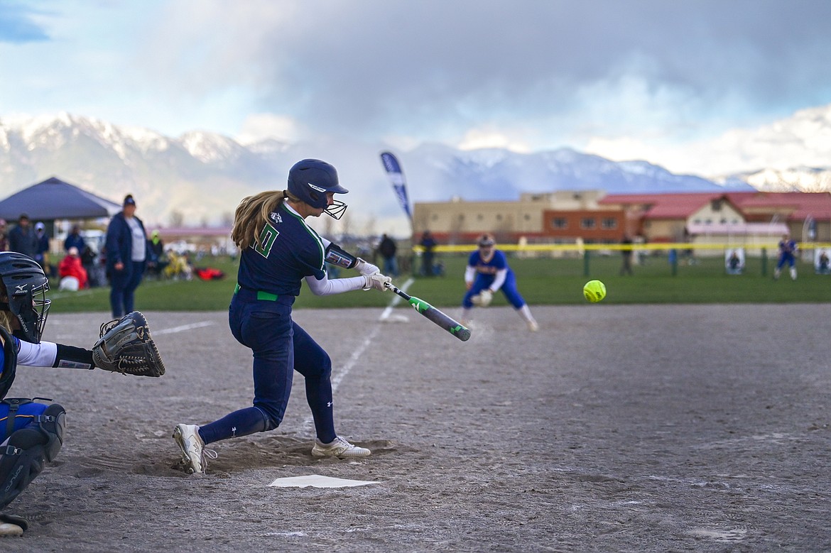 Glacier's Olivia Warriner (10) connects on a single in the bottom of the eighth inning against Missoula Big Sky at Glacier High School on Tuesday, April 30. (Casey Kreider/Daily Inter Lake)
