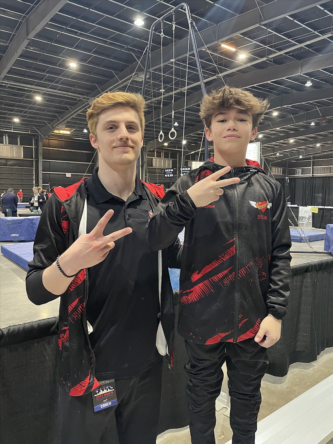 Courtesy photo
Avant Coeur Gymnastics coach Matthew Auerbach, left, and Level 9 Dylan Coulson at Western National Championships in Chandler, Ariz.