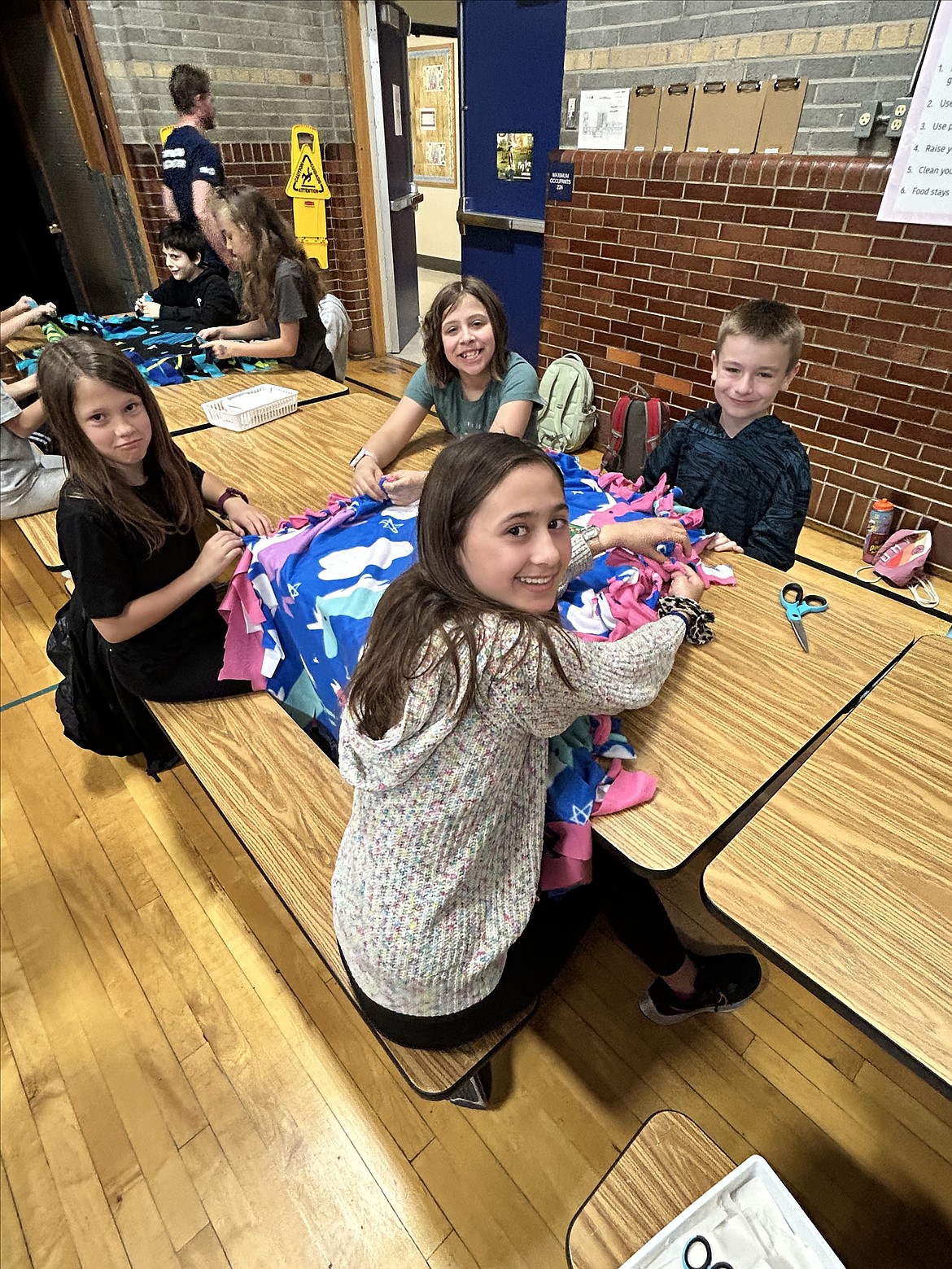 Growing the STEM’s student leadership team recently worked with students at Borah Elementary School to celebrate Global Youth Service Day and discuss the importance of community service. Borah students made fleece tie blankets for children hospitalized at Kootenai Health. Clockwise, from top left: Ben Nelson, Dani Fleming, Gracie Bergsma, Abel Rosen, Addasyn Gentry and Natalie Gittel.