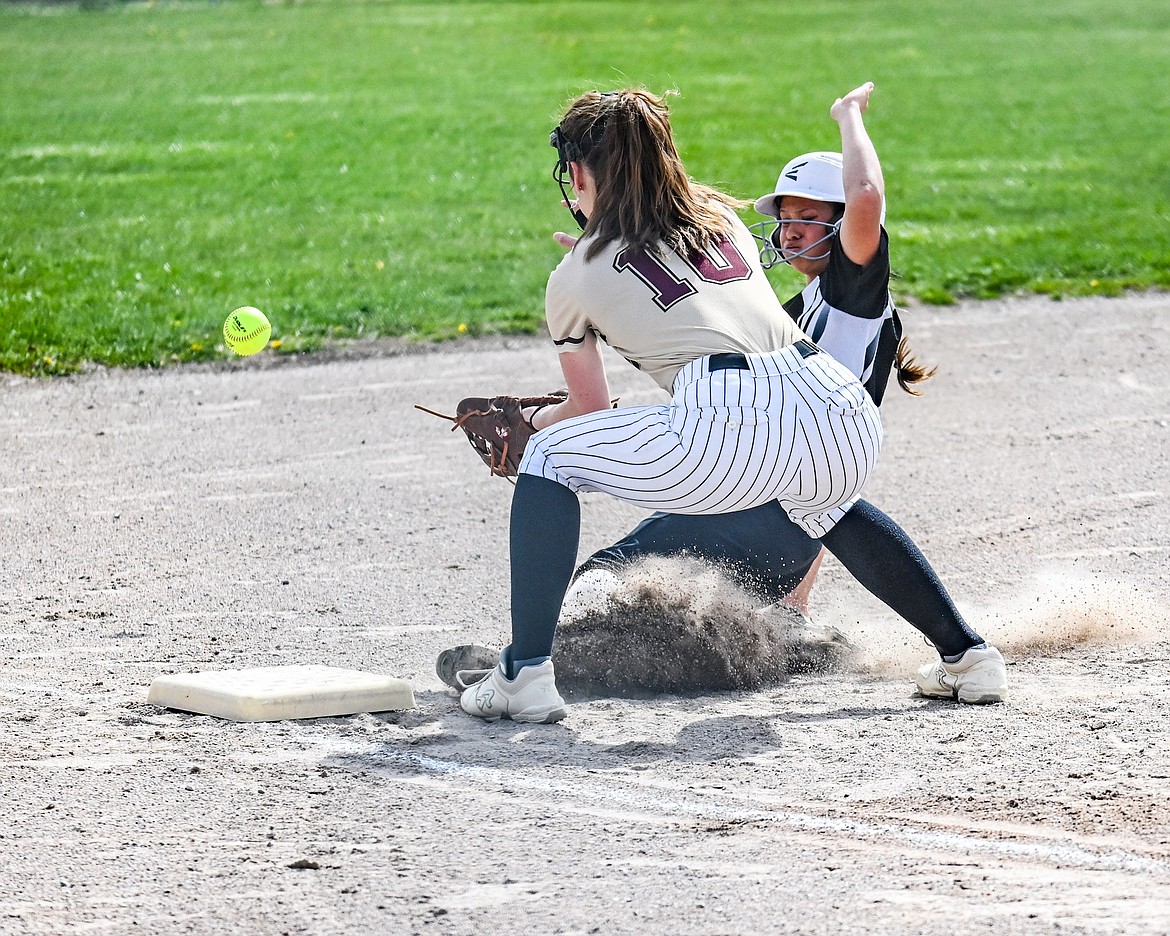 GG Hawk slides in during Mission-Arlee-Charlo's triumphant game against Florence last Tuesday. (Christa Umphrey photo)