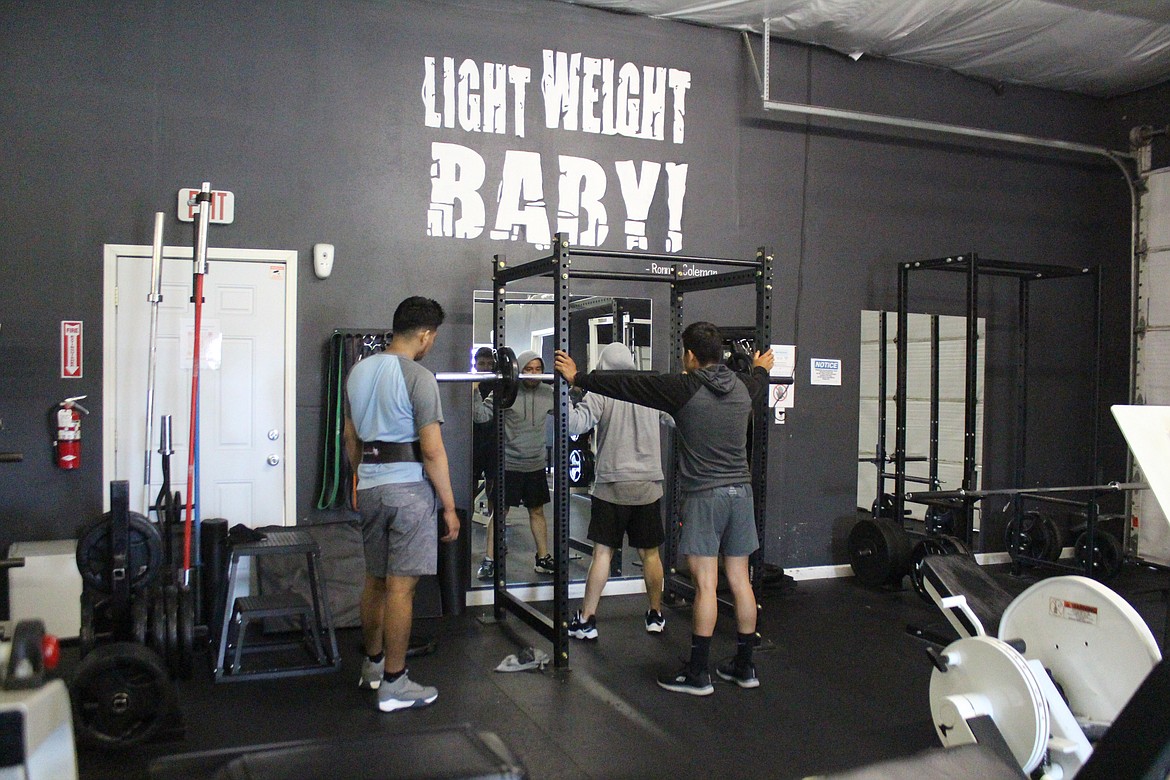 Mattawa Fitness Club members work on strength training.