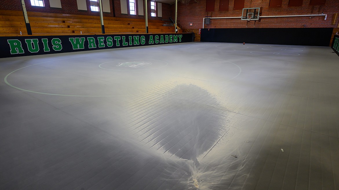 Fire retardant covers the new mats at the Ruis Wrestling Academy Monday. (Hungry Horse News)