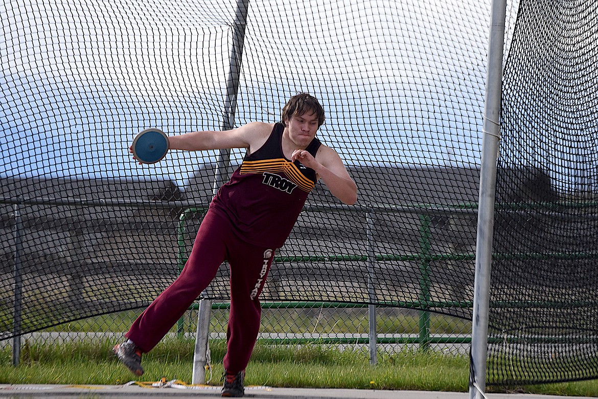 Troy's Jacob Gromley competes in the discus at the Lincoln County Track and Field Meet Tuesday, April 30, 2024, in Eureka. (Scott Shindledecker/The Western News)