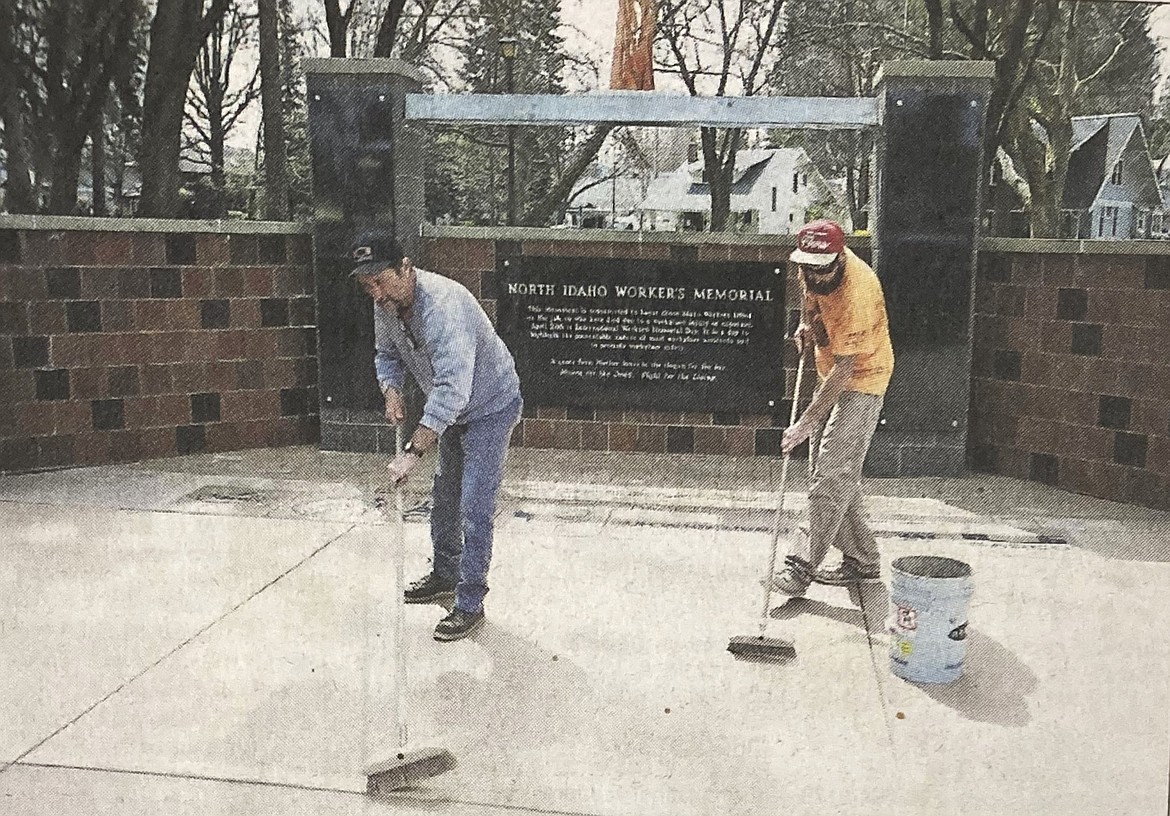 Dennis and Kam Murphy of Garco prepare North Idaho Worker's Memorial for grand opening.