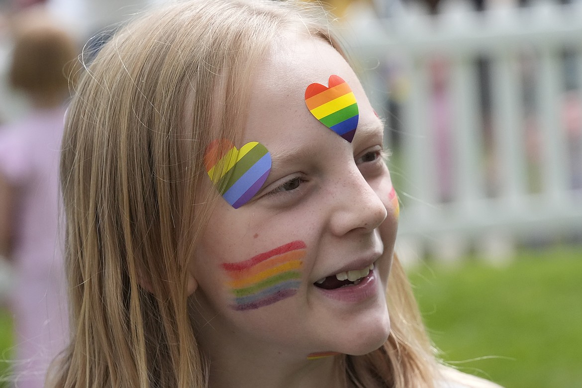 Bonneville Elementary School 5th grader Graham Beeton, is interviewed during a block party supporting trans and non binary students and staff Monday, April 29, 2024, in Salt Lake City. Utah will become the latest state to implement restrictions for transgender people using school bathrooms and locker rooms in public schools and government-owned buildings when key components of a law passed by the Republican controlled Legislature take effect May 1. (AP Photo/Rick Bowmer)