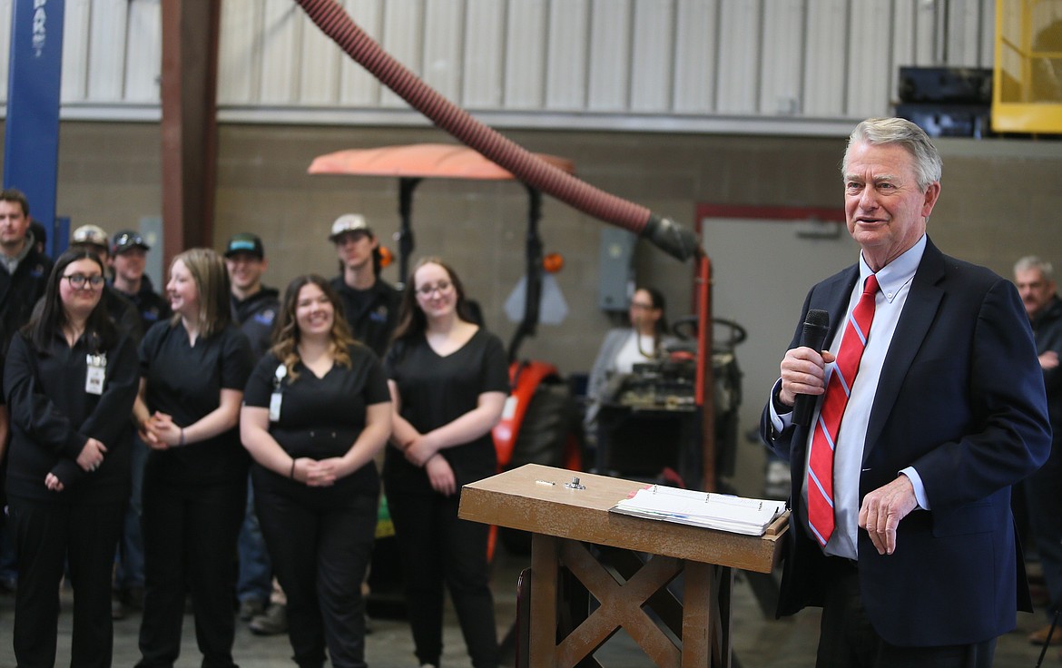 Students listen as Gov. Brad Little discusses progress made with his Idaho Works plan and Idaho LAUNCH program during a Wednesday press conference at KTEC.