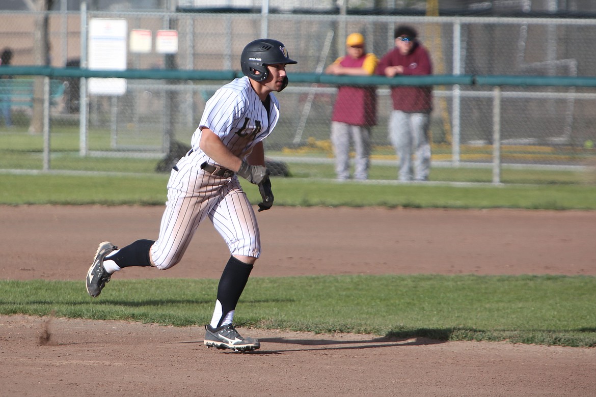 Moses Lake junior Cooper Hancock runs to third base during Tuesday’s game against West Valley (Yakima).