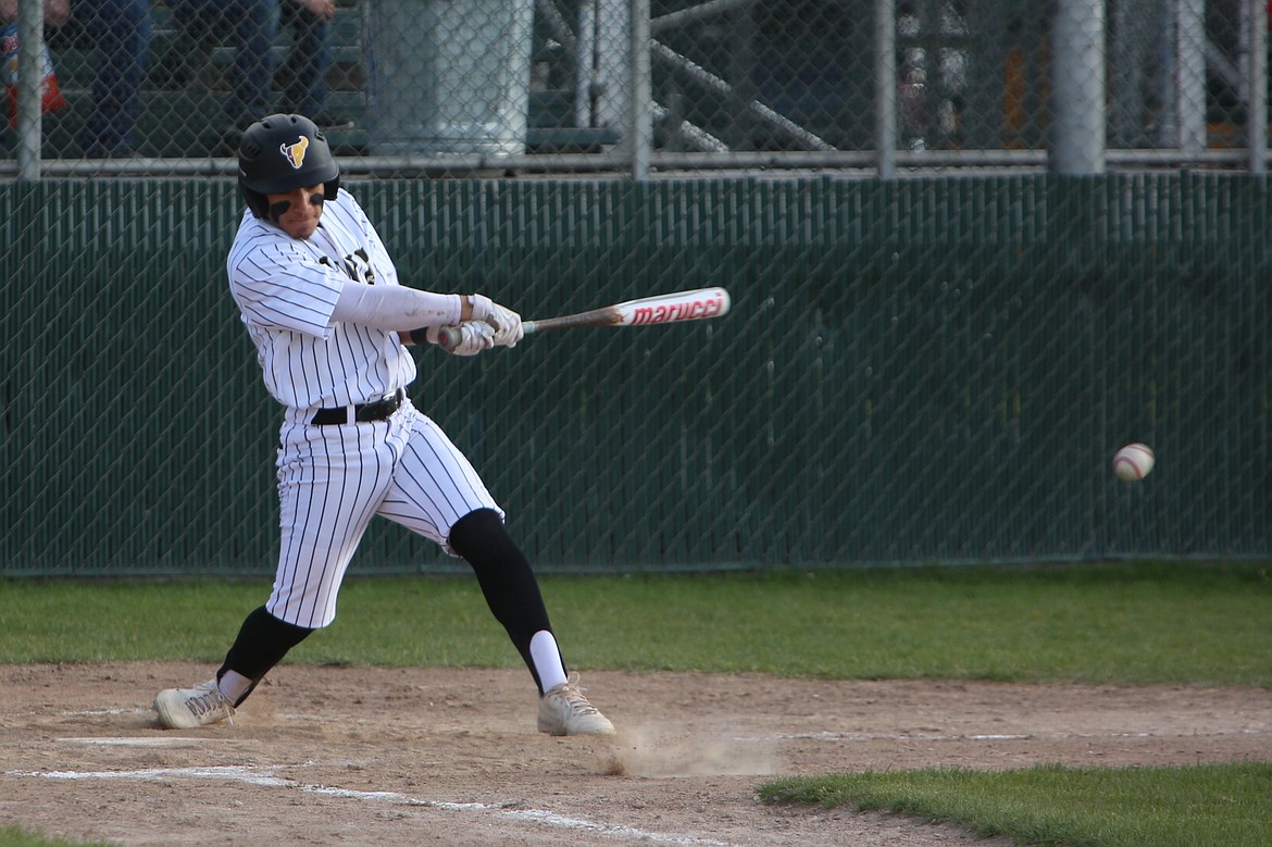 Moses Lake junior Jackson Carlos singles on a ground ball for an RBI in the bottom of the third inning against West Valley (Yakima).