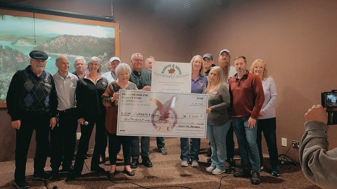 Turkeys & More was excited to receive a donation of $1,500 recently from the Coeur d'Alene Aerie 486 Eagles to help pay for Thanksgiving turkeys. A celebration thank you was given at the Eagles by Turkey President Nancy Nelson Walz. She said plans are to buy 2,000 turkeys again this year to serve local families who are financially stressed. Walz anticipates around 10,000 people will be able to enjoy a holiday dinner in their home because of the wonderful support and donations from the Eagles and others in the community that want to help. Founder Evalyn Adams expressed her gratitude to the Eagles who have contributed turkey money for the last seven years for a grand total of $7,000. For more information, visit TurkeysandMore.org or call Adams at 208-765-5535. Pictured from left: Loren Walz, Turkeys & More committee; Jamie Walton, Inside Guard; Scott Sutherland, Worthy secretary; Nancy Nelson, Turkeys & More president; Rod Stach, trustee; Evalyn Adams; Bill Griffiths, Turkeys & More treasurer; Matt Sullivan, trustee; Laura Sutherland, Worthy president; Mike Blanton, Eagle member; Cathy Moruzzi, Worthy treasurer; Frank Burnette, Worthy conductor; Michael Walker, Worthy past president; and Judey Brown, trustee.