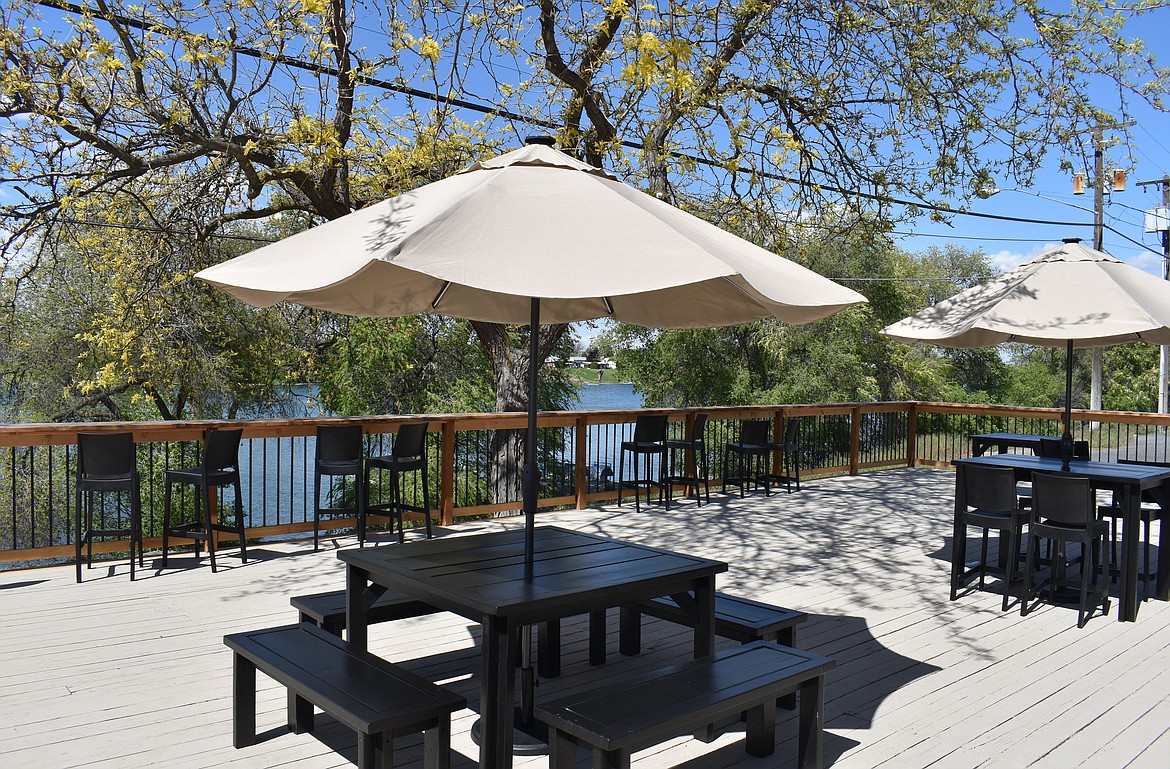 One of the proudest features at Moore Brewing Company is the open deck overlooking the lake.