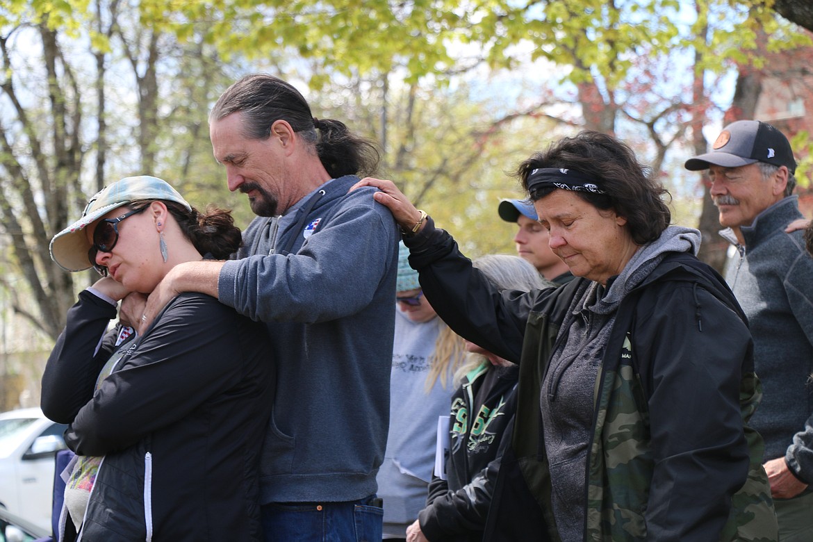 Area residents pray at Thursday's National Day of Prayer event at Farmin Park. The annual event gathers the faithful to pray for various areas in the nation.