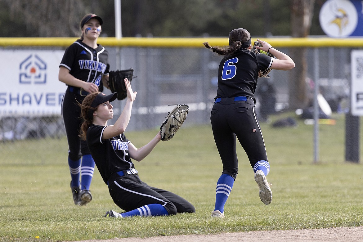 Courtesy photo
Coeur d'Alene second baseman Chloe Burke (6) makes a circus catch in shallow center field as center fielder Abby Moehring (7) and right fielder Morgan Knutson (8) back her up Thursday afternoon at Larry Schwenke Field in Coeur d'Alene.