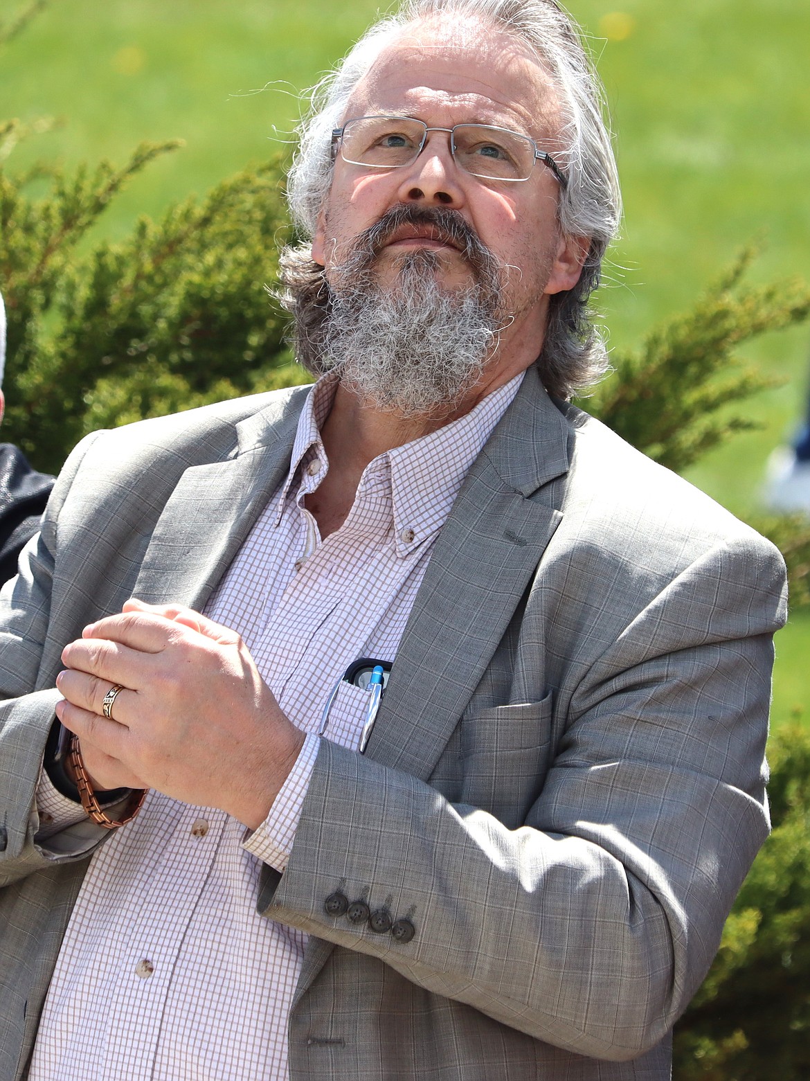 Pastor Tim Remington looks up during the National Day of Prayer in Coeur d'Alene on Thursday.