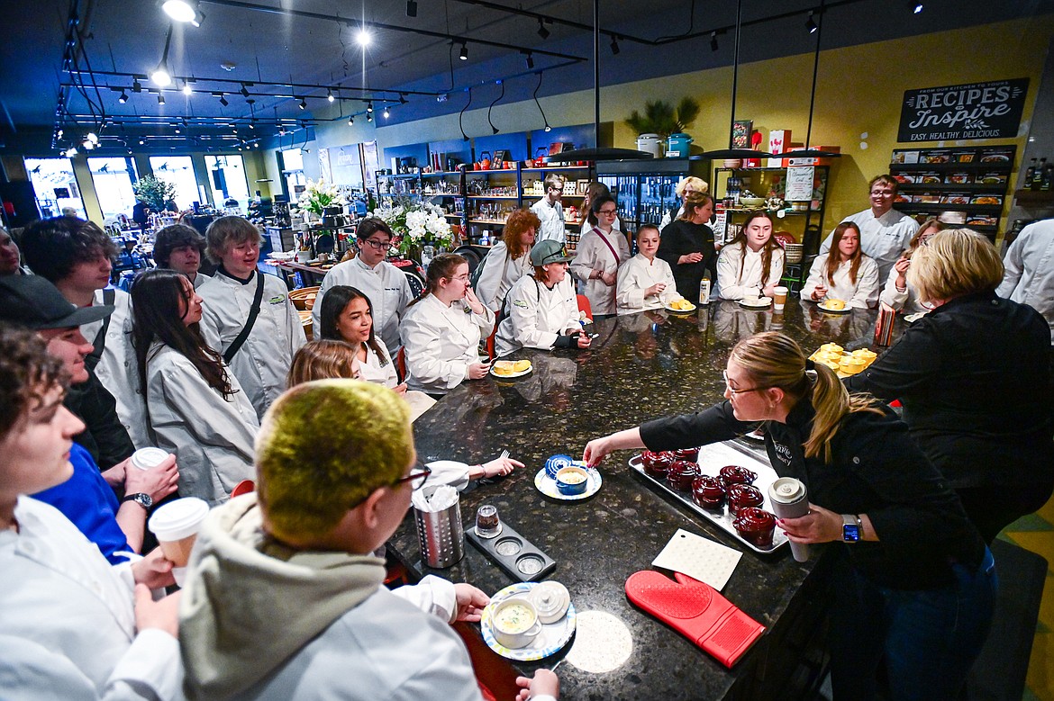 Mallory and Julie Hickethier, co-owners of Trovare, hand out dishes of coddled eggs, a recipe by Whitefish chef Gina Simmons, to Glacier High School culinary students during a tour of Whitefish eateries and restaurants on Friday, May 3. Each student was able to keep the dish the eggs were served in, a Mini Round Cocotte by Le Creuset. (Casey Kreider/Daily Inter Lake)