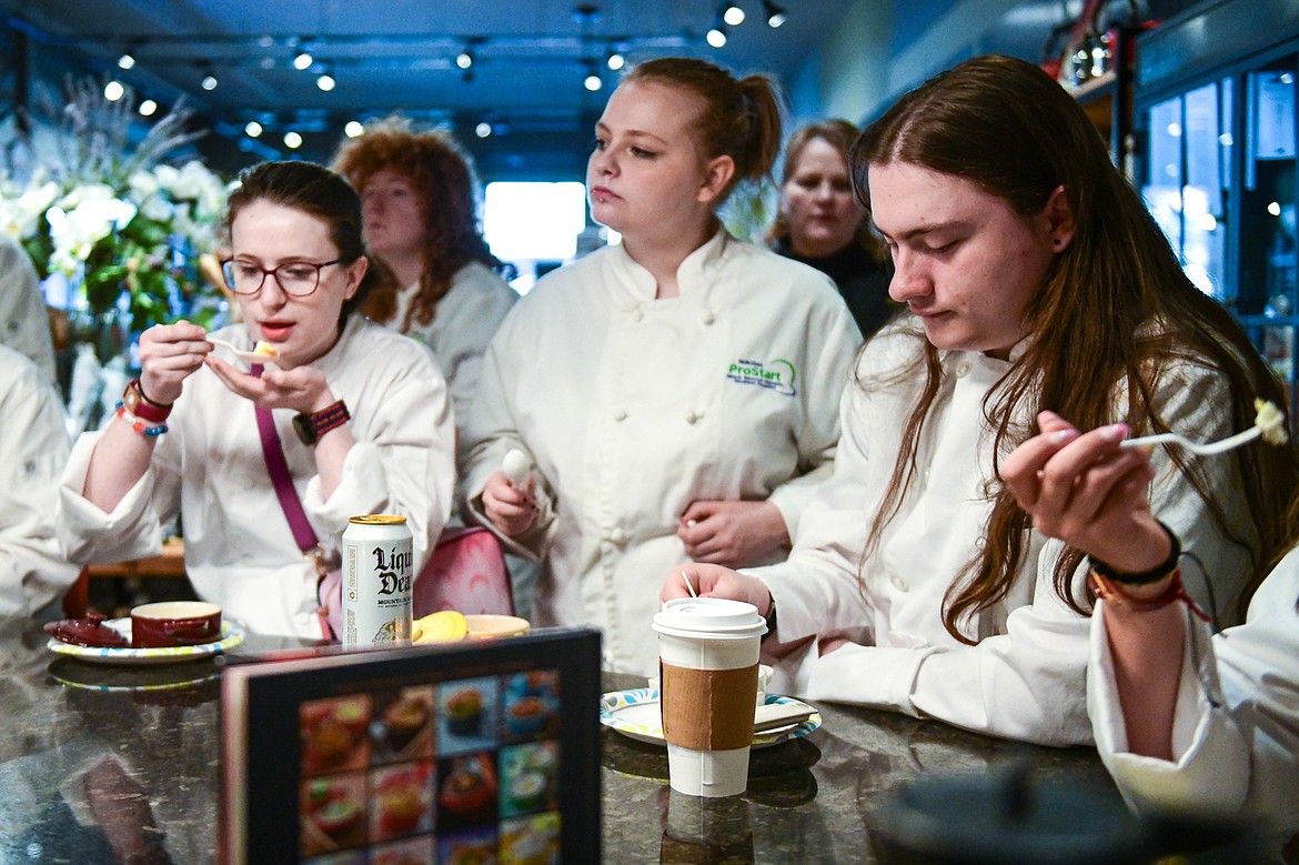 Glacier High School culinary students enjoy a dish of coddled eggs at Trovare during the students' tour of Whitefish eateries and restaurants on Friday, May 3. Each student was able to keep the dish the eggs were served in, a Mini Round Cocotte by Le Creuset. (Casey Kreider/Daily Inter Lake)