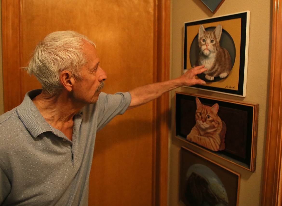 It's not just cars - Tim Scarola has crafted many wood and paint 3D creations, including of beloved housecats and other animals.